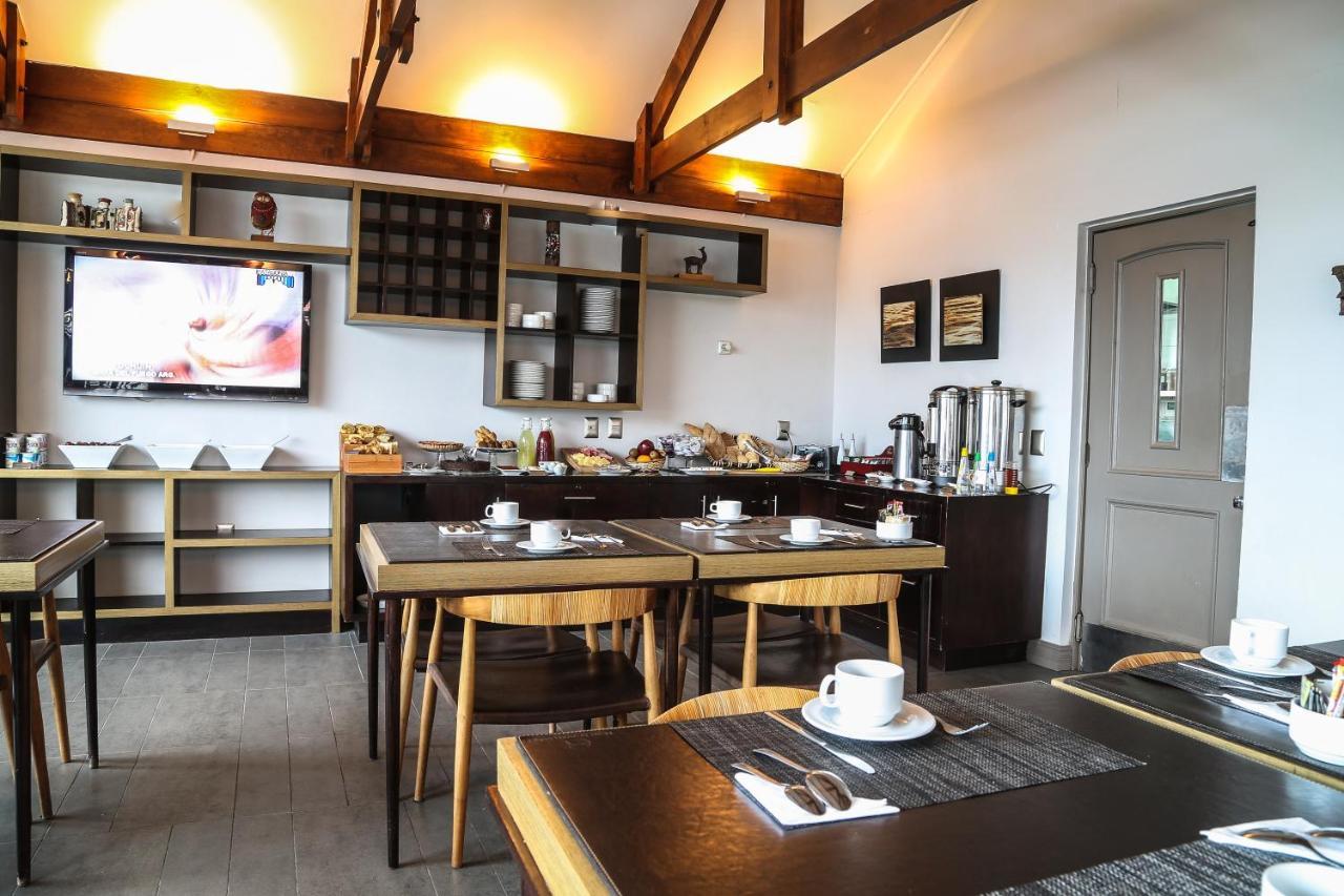 פורטו נטאלס Hotel Martin Gusinde מראה חיצוני תמונה